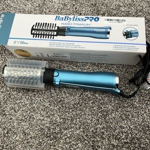 Babyliss PRO Nano Titanium hot brush hair dryer.